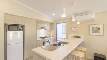 One Bedroom Holiday Home (1BR) | Private kitchen | Microwave, stovetop, electric kettle, toaster