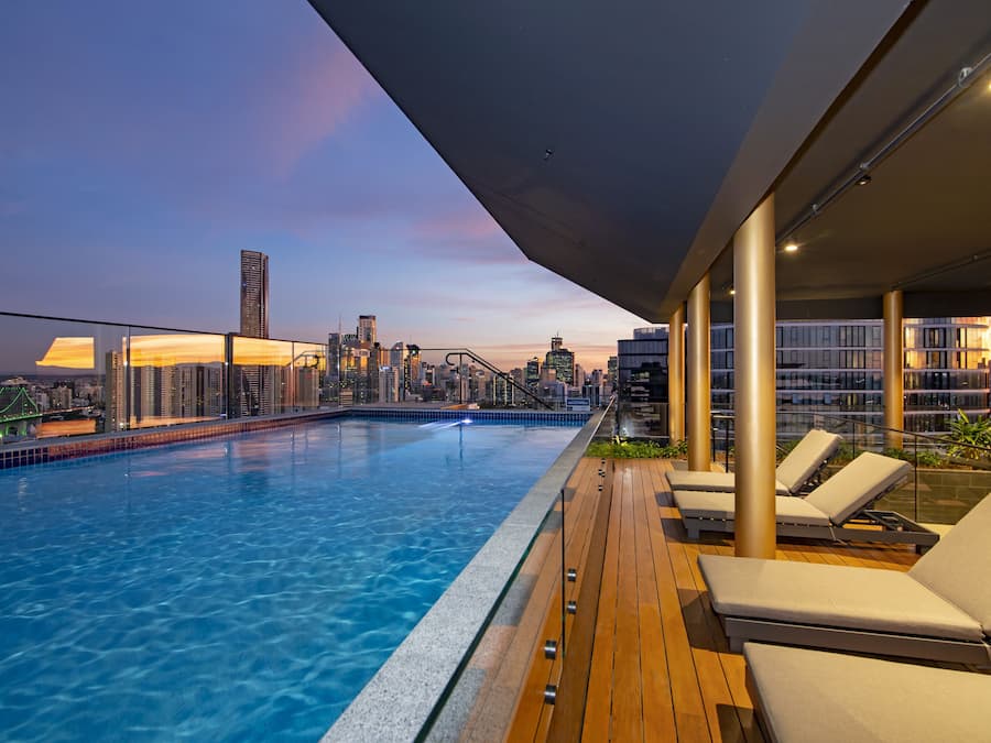 Outdoor pool, open 6:00 AM to 9:00 PM, pool loungers