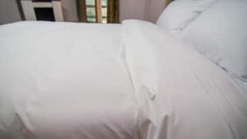 Blackout curtains, soundproofing, free WiFi, bed sheets