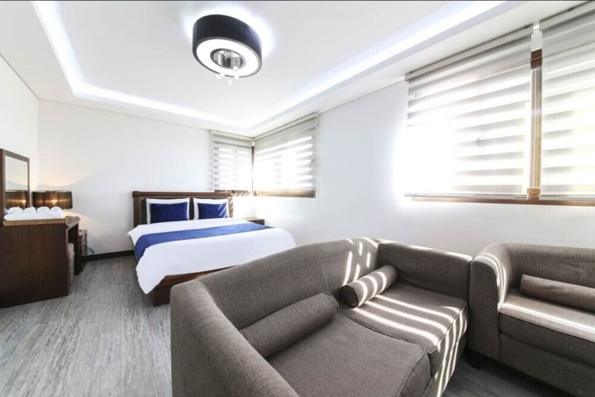 room (superior family) | living area | flat-screen tv