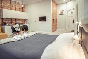 Deluxe Studio Suite, 1 Bedroom, Non Smoking, Kitchenette | Free minibar, desk, iron/ironing board, free WiFi - Gruda Apartments (Kwidzyn)