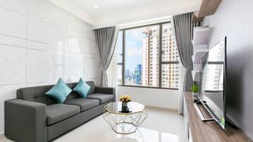 Luxury Apartment, 2 Bedrooms | Living room | 45-inch Smart TV with digital channels, TV, pay films