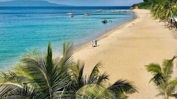 On the beach, white sand, snorkeling