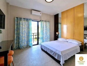 Deluxe Double Room | Blackout drapes, free WiFi, bed sheets - Rold and Roub Home Suites by Cocotel (Puerto Galera)