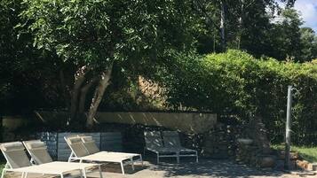 Seasonal outdoor pool, open 10:00 AM to 8:00 PM, sun loungers