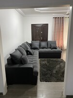 Apartment | Living room | 30-inch TV with cable channels