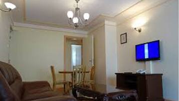 Apartment, 2 Bedrooms | Living area | TV
