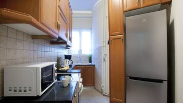 Apartamento, 1 habitación | Cocina privada | Frigorífico, microondas, horno y placa de cocina