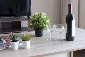 Apartment, 1 Bedroom | Living area | Flat-screen TV