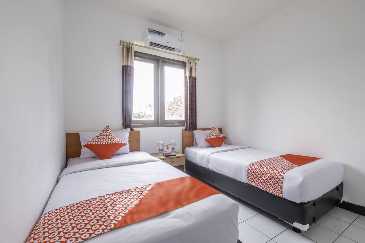 Habitación estándar con 2 camas individuales | Wifi gratis y ropa de cama
