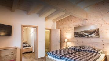 Familienzimmer (Kleine Hüttensuite) | Individuell dekoriert, Bettwäsche