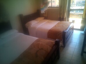 Twin Room | Desk, bed sheets - Montanna Inn (Thika)