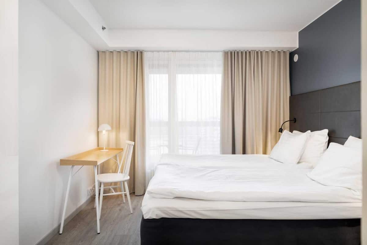 In-room safe, desk, laptop workspace, blackout curtains