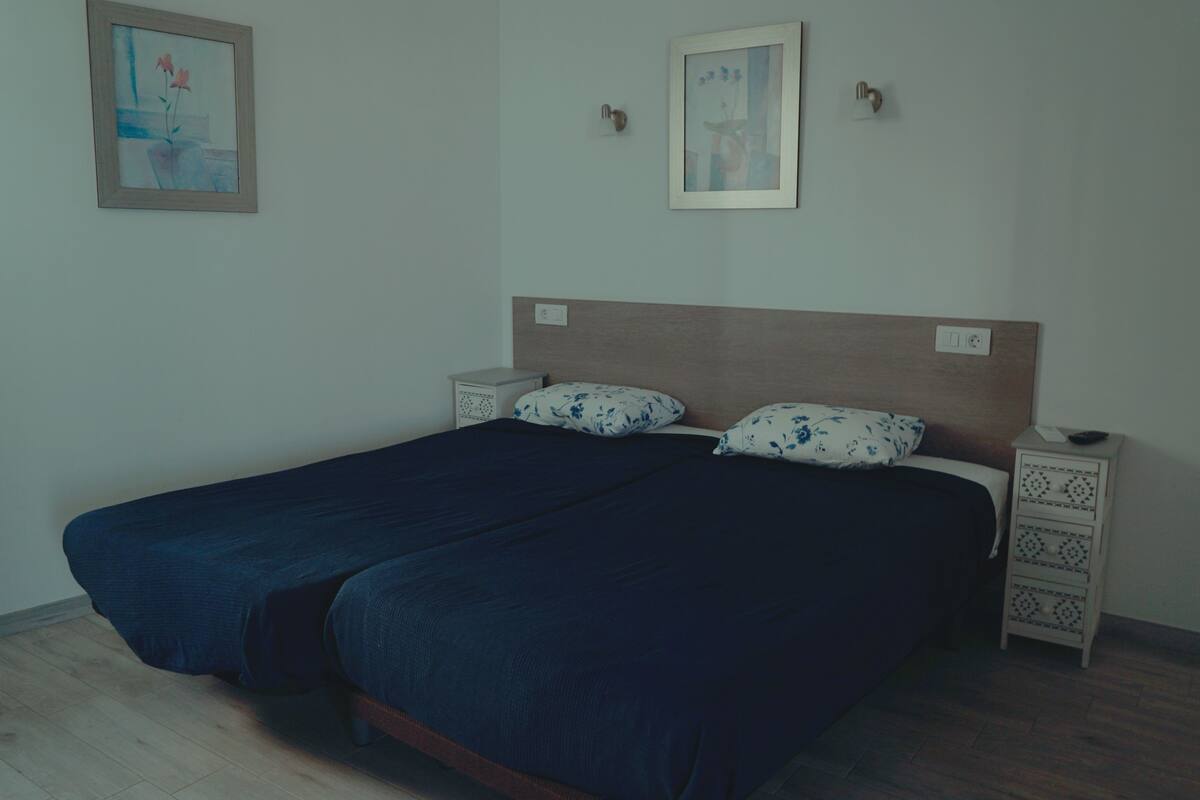 Family Studio, Kitchen, Courtyard Area | Blackout curtains, free cots/infant beds, bed sheets