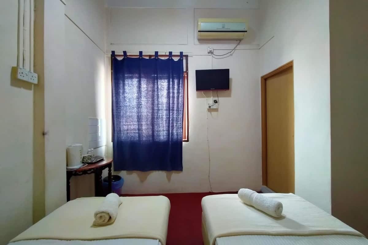 Habitación estándar con 2 camas individuales | Wifi gratis y ropa de cama
