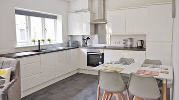 Exclusive Apartment, 1 Bedroom | Private kitchen | Full-sized fridge, microwave, oven, stovetop