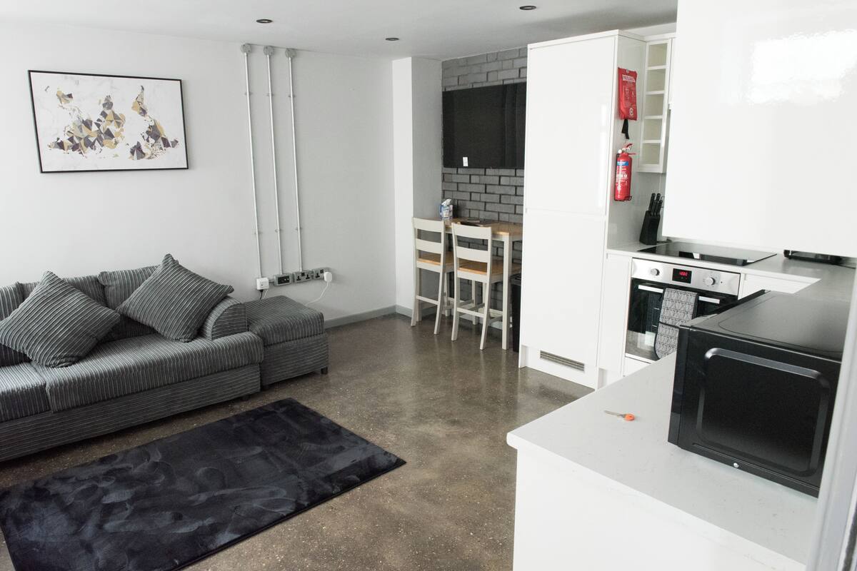 Dúplex City, 1 habitación | Zona de estar | Una Smart TV