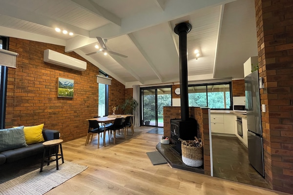 Enjoy an open plan setting with a wood heater for great ambience