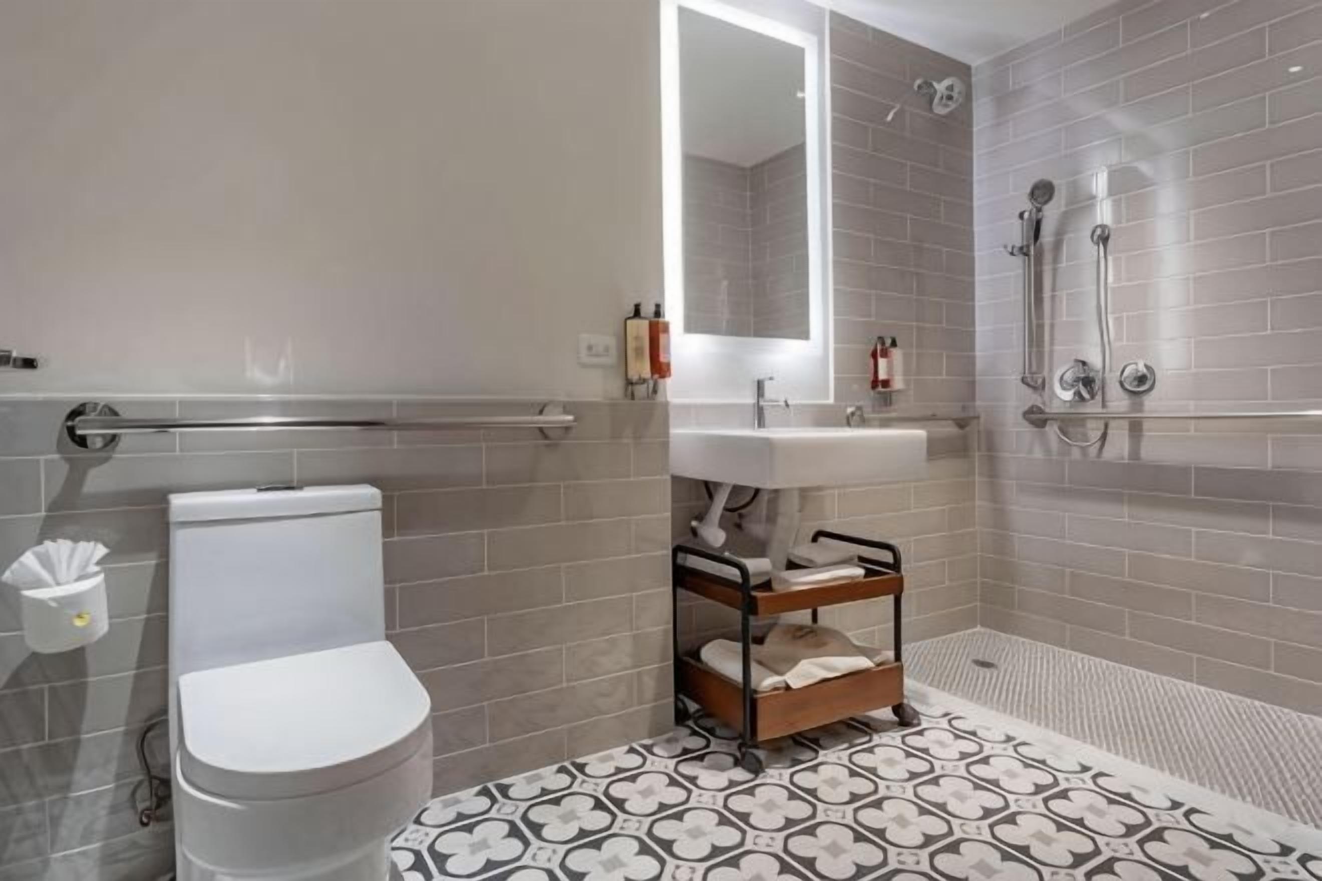 Designer toiletries, hair dryer, towels, soap