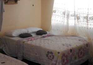 Neljän hengen deluxe-huone | Yksilöllisesti sisustettu, yksilöllisesti kalustettu