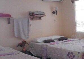 Deluxe Quadruple Room | Individually decorated, individually furnished, iron/ironing board