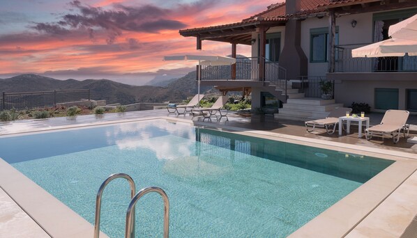Outdoor pool, pool umbrellas, pool loungers