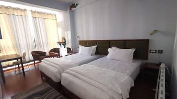 Deluxe Twin Room | Kalis bunyi, seterika/papan seterika, Wi-fi percuma, cadar katil