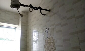 Shower, rainfall showerhead, towels, soap