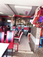 Breakfast, lunch, dinner served; local cuisine 