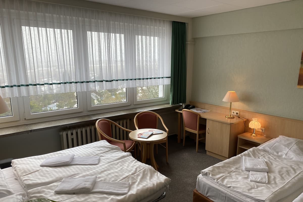 Desk, cribs (free), rollaway beds (surcharge), WiFi (free)