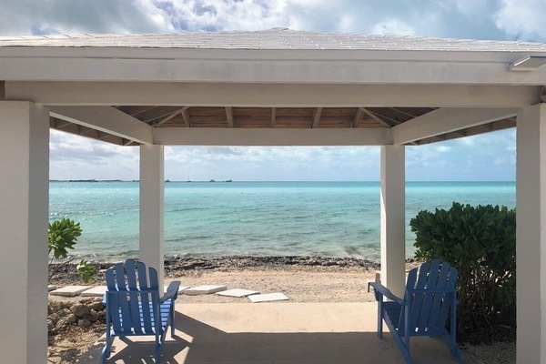 Cabana at the beach looking out on the crystal clear water
