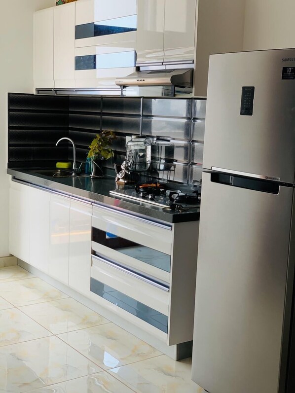 Family Apartment | Private kitchen | Full-sized fridge