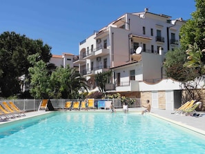 Seasonal outdoor pool, pool loungers