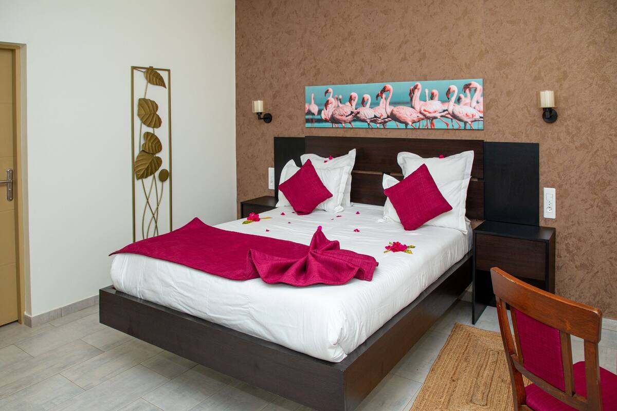 Premium bedding, pillowtop beds, minibar (free items), in-room safe