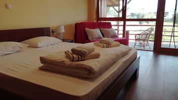 Luxury Triple Room, Garden View | Premium bedding, pillow-top beds, individually furnished, desk