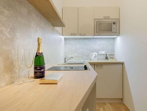 Fridge, microwave, stovetop, electric kettle