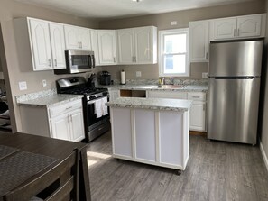 Fridge, microwave, oven, stovetop - Relax close to the lakefront! Three bedroom Avon Lake retreat just steps away. (AVON LAKE)