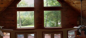 Lake Cabin in beautiful wooded setting overlooking crystal clear lake.