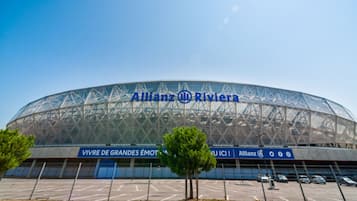 A large, modern stadium with the Allianz Riviera logo.