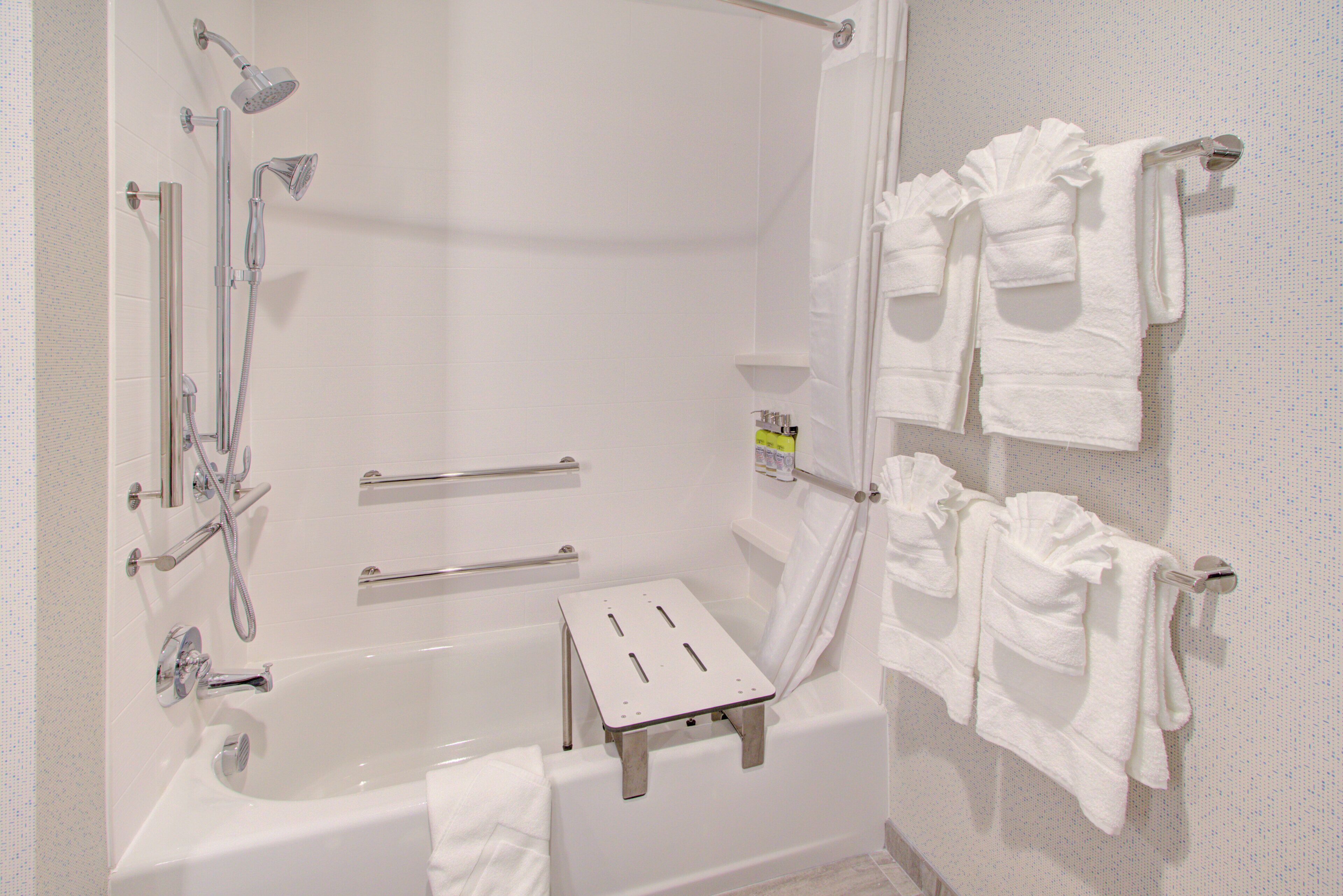 suite, 1 king bed, mobility accessible (accessible tub) | bathroom | hair dryer, towels, soap, shampoo