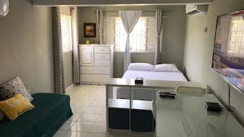 1 bedroom, laptop workspace, iron/ironing board