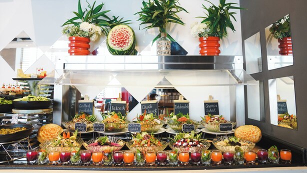 A buffet with various food options and drinks. - ibis Jeddah City Center (Jeddah)