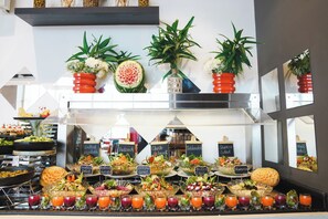 A buffet with various food options and drinks. - ibis Jeddah City Center (Jeddah)