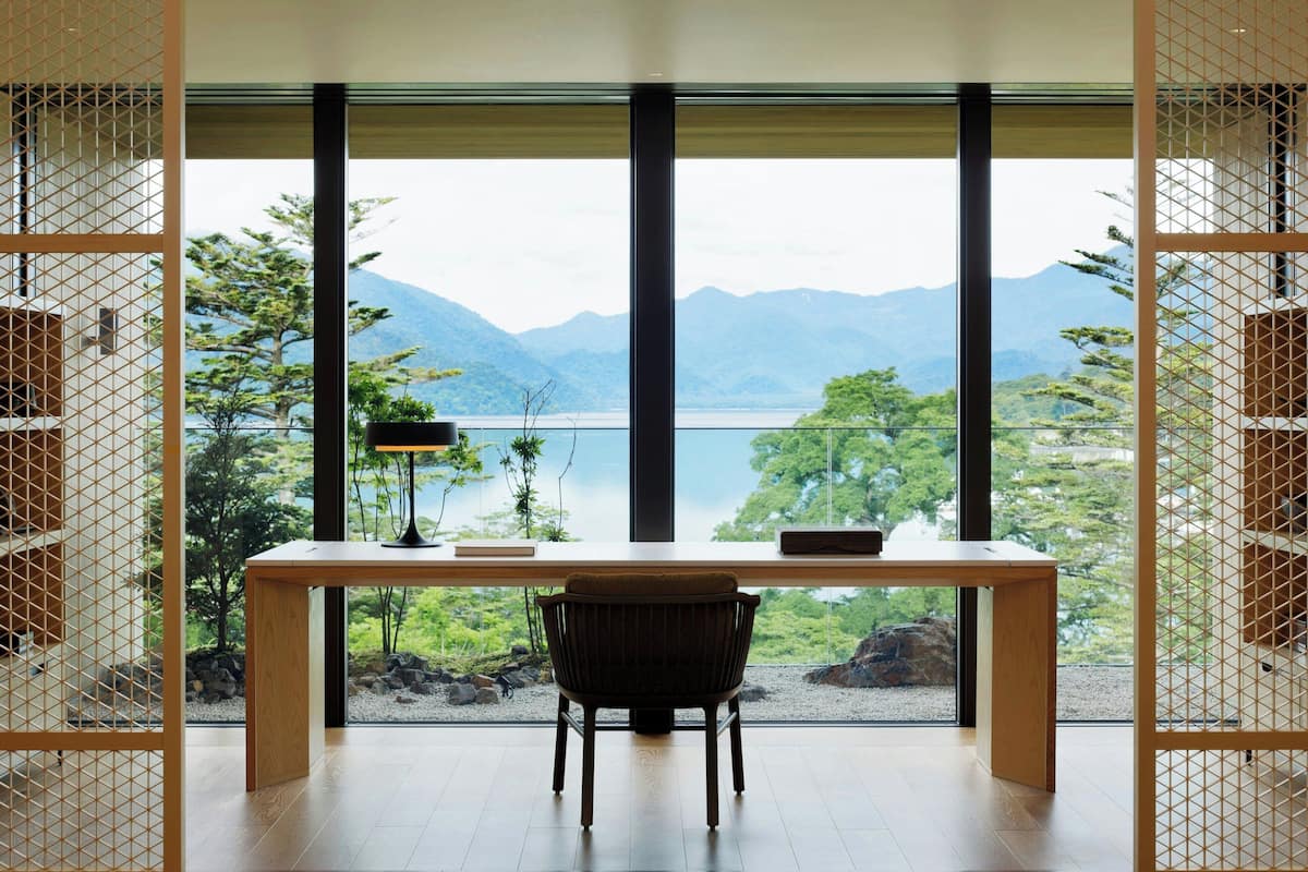 suite, 1 king bed, non smoking, lake view (balcony) | 1 bedroom, premium bedding, minibar, in-room safe