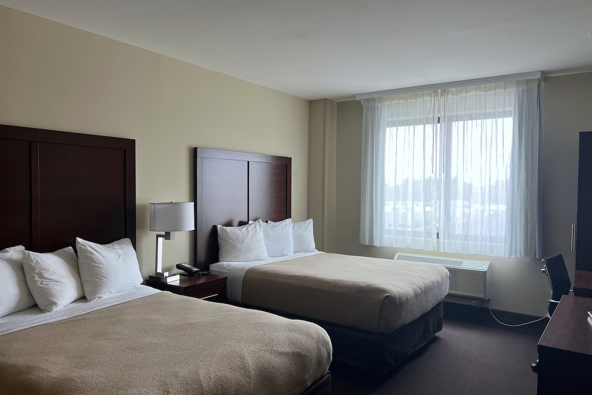 room, 2 queen beds, non smoking | desk, blackout curtains, iron/ironing board, free wifi