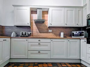 Oven, dishwasher, high chair, cookware/dishes/utensils