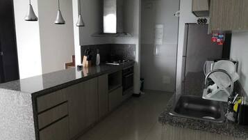 Microwave, coffee/tea maker, cookware/dishes/utensils