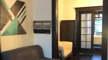 Apartment, 1 Bedroom | 1 bedroom, blackout drapes, iron/ironing board, free WiFi