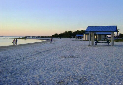 Spacious 3 BR 2 Bath  House On Deep Canal With Screened Heated Pool 