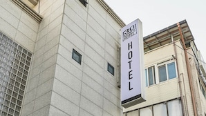 A hotel sign indicating a 30-month stay. - 30 month HOTEL (Seoul)